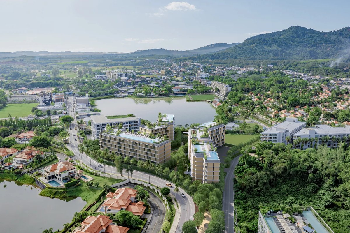 Laguna Lakeside Residences — aerial view of the complex among the hills